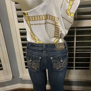 L. A. Idol USA jeans w/ cross stitching and rhinestones on the pockets & buttons
